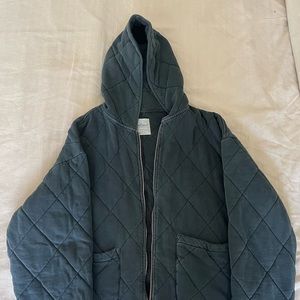 Black zip up sweatshirt.